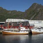 a couple of boats that are sitting in the water